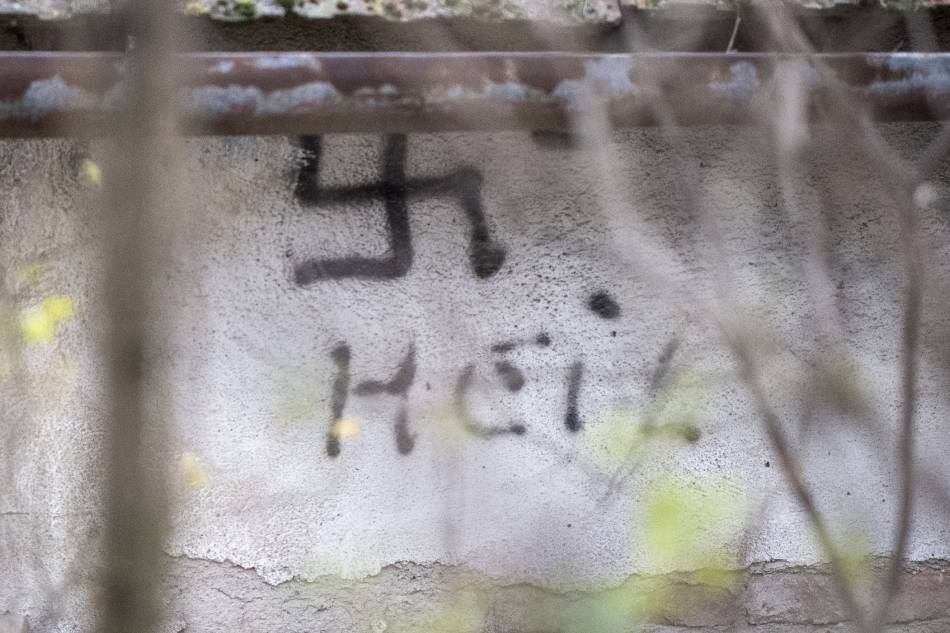 A Nazi swastika symbol and the slogan 'Heil' is seen on a wall in Velm-Goetzendorf, Austria, 01 December 2019 (issued 02 December 2019. EPA-EFE/CHRISTIAN BRUNA
