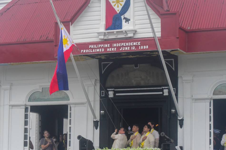 The Philippine flag is raised during the 125th Independence Day rites, led by Executive Secretary Lucas Bersamin, at the Aguinaldo Shrine in Kawit, Cavite on June 12, 2023. Mark Demayo, ABS-CBN News