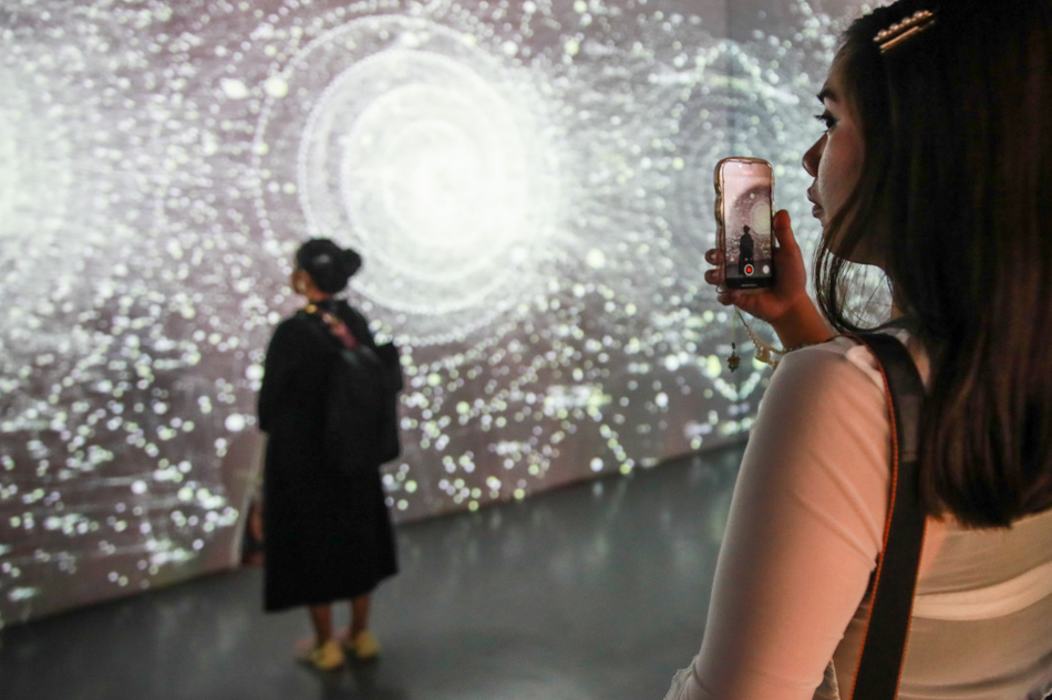 Visitors take a look at the 