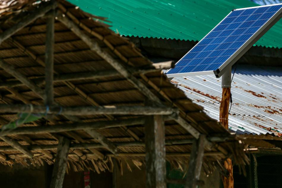 Solar panels appear on rooftops of houses at a village in Barangay Buluang, Busuanga, in Palawan on November 29, 2022, as ACCIONA, a Spanish sustainable infrastructure and renewable energy conglomerate, launches its Lights at Home Project that will install residential photovoltaic systems in off-grid homes. Jonathan Cellona, ABS-CBN News