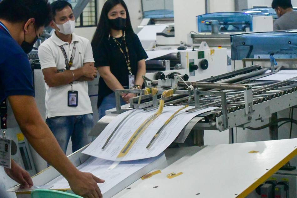 Workers at the National Printing Office in Quezon City prepare test ballots before printing the official ballots and accountable forms for the Barangay and Sagguniang Kabataan Elections on Aug. 21, 2023. The Barangay and SK Elections is set to be held on the last Monday of October after it was moved from December 5, 2022. Mark Demayo, ABS-CBN News