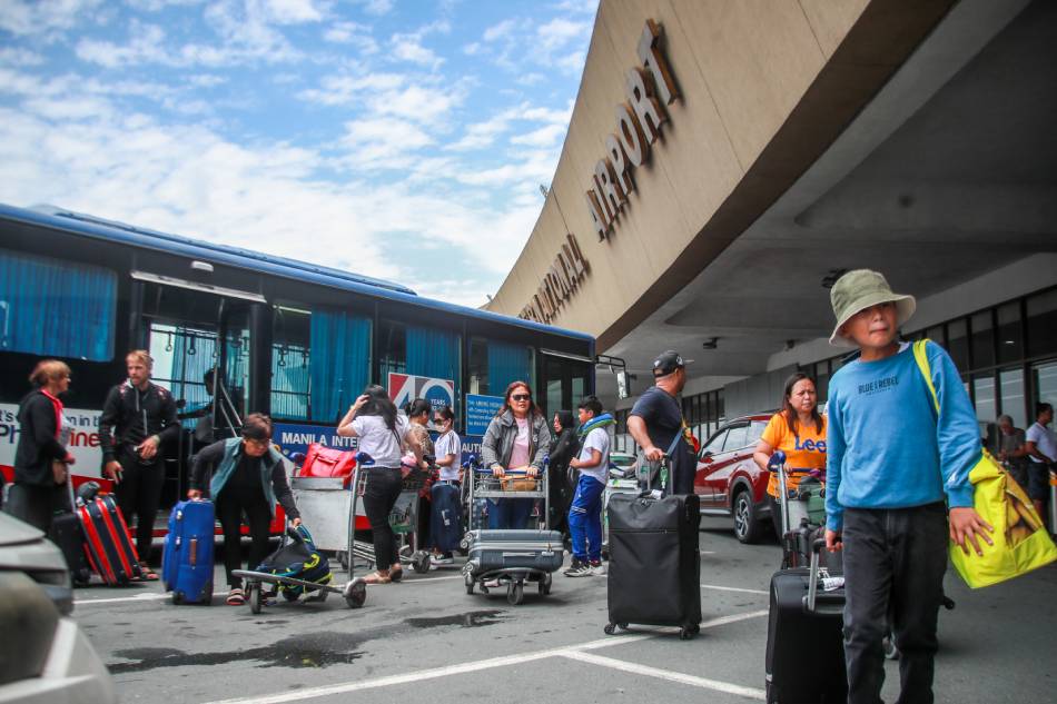 Travelers arrive at the Ninoy Aquino International Airport (NAIA) Terminal 1 in Pasay City on August 4, 2023. Jonathan Cellona, ABS-CBN News