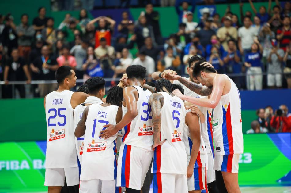 Gilas Pilipinas and fans celebrate after the team beat China in their FIBA 2023 World Cup match at the Araneta Coliseum in Quezon City on September 2, 2023. Jonathan Cellona, ABS-CBN News