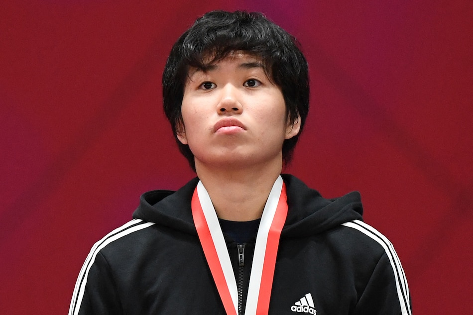 Kiyomi Watanabe stands during the awards ceremony women's judo -63 kg at the 2018 Asian Games in Jakarta on August 30, 2018. Sonny Tumbelaka, AFP/File.