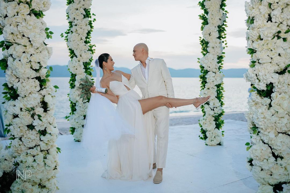 Maxine Medina and Timmy Llana pose for a photo during their second wedding in Palawan. Maxine Medina/Instagram