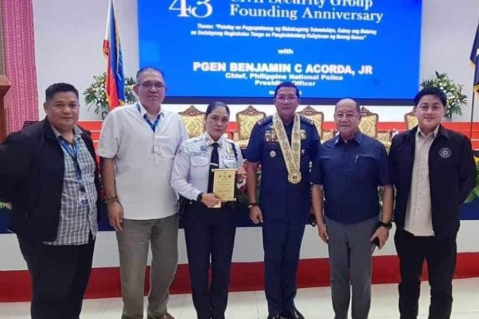 Lady guard honored for exemplary act