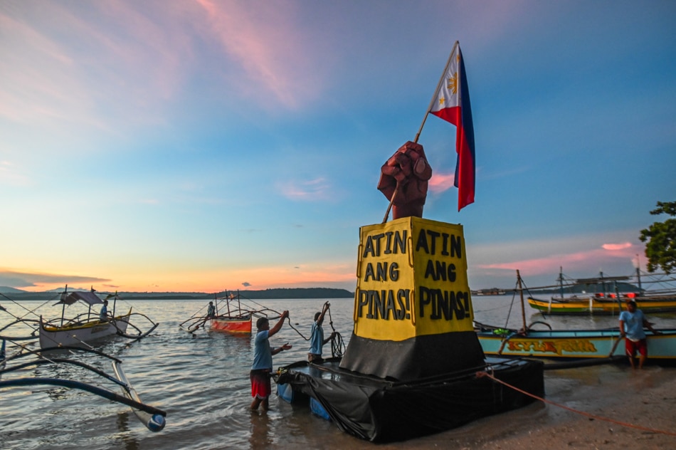 Fishermen set symbolic buoy afloat in West PH Sea | ABS-CBN News