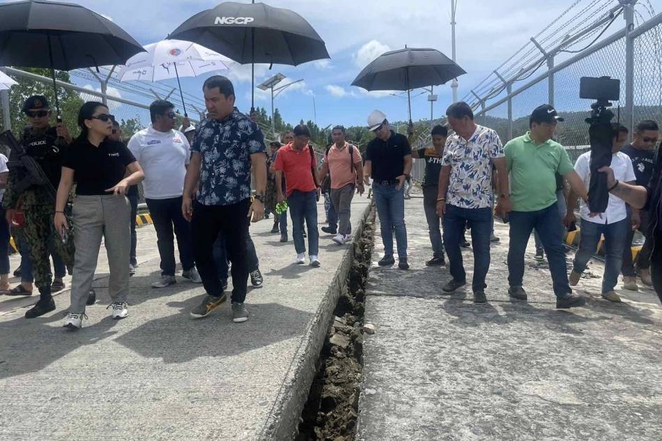 Officials inspect the damage caused by magnitude 6.8 earthquake in the town of Glan in Sarangani province. Dennis Datu, ABS-CBN News