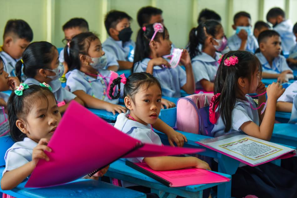  Students accomplish a seat work as school year 2023-2024 opens at the Corazon Aquino Elementary School in Quezon City on Tuesday, August 29, 2023. Maria Tan, ABS-CBN News