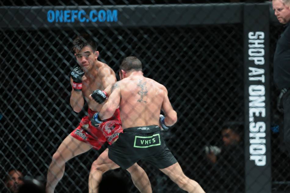 Joshua Pacio during his strawweight world championship match against Jarred Brooks for ONE 164 at the Mall of Asia Arena in Pasay City on December 3, 2022. George Calvelo, ABS-CBN News