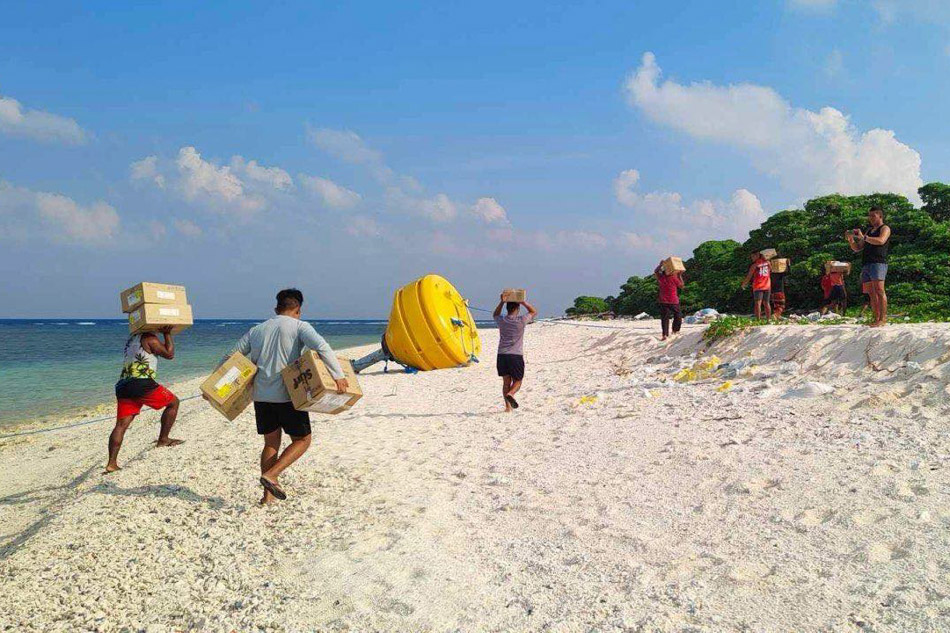 LOOK: Civilian resupply mission arrives in Lawak Island | ABS-CBN News