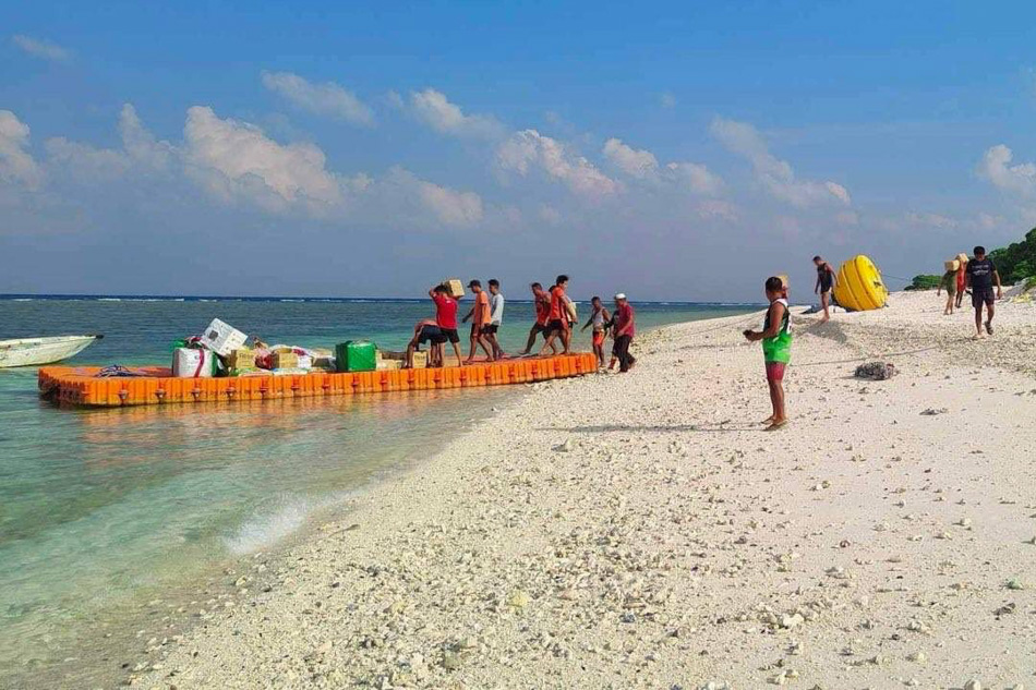 LOOK: Civilian resupply mission arrives in Lawak Island | ABS-CBN News