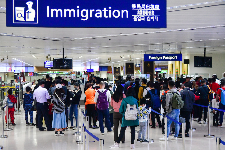 Passengers pass through Philippine immigration at the NAIA Terminal 1 in Parañaque City on Jan. 23, 2020. Mark Demayo, ABS-CBN News/File