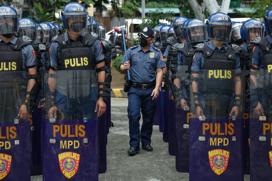 Members of the Manila Police District stand in formation during an inspection inside their headquarters in Manila on July 22, 2022. Photo by George Calvelo, ABS-CBN News