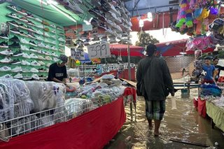 Marikina bazaar stalls forced to pack up as river swells