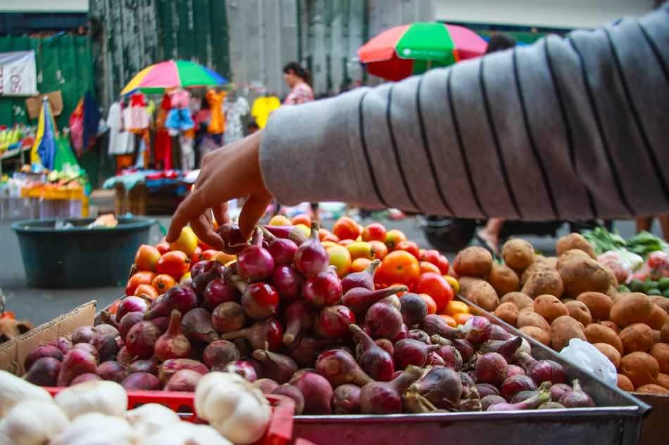 Red onions are sold at the Paco Market in Manila on December 28, 2022. Jonathan Cellona, ABS-CBN News/File