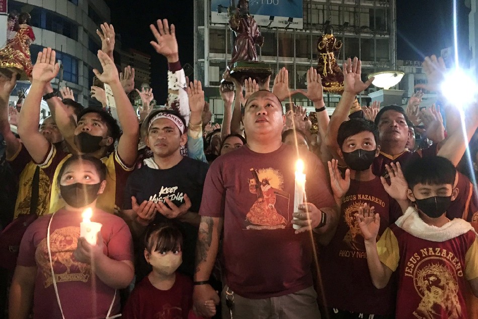 Devotees at the Quiapo Church in Manila pay tribute to the Black Nazarene on Jan. 8, 2023. Karen de Guzman, ABS-CBN News