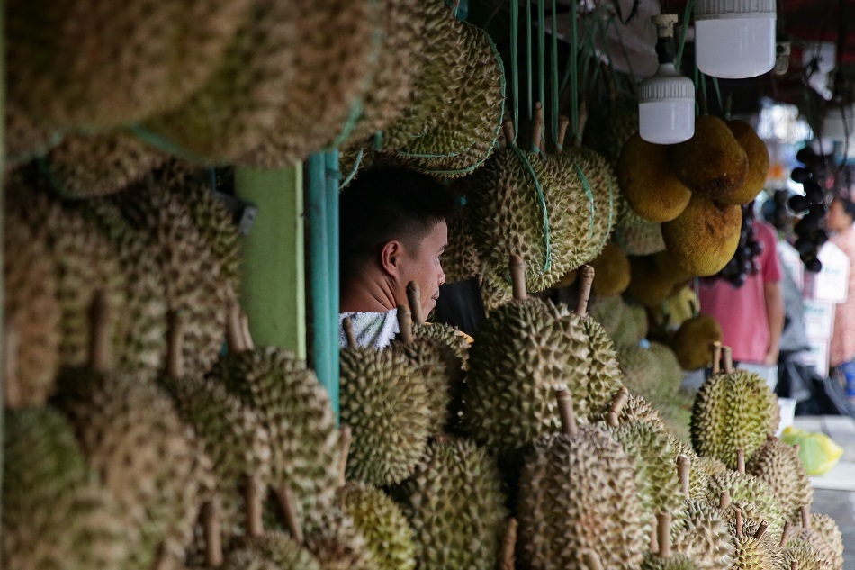  Durian and pomelo vendors man their stalls at a market in Davao City on June 18, 2022. George Calvelo, ABS-CBN News