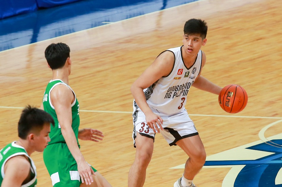 Carl Tamayo (33) of the UP Fighting Maroons during their match against the De La Salle Green Archers for the opening games of the UAAP Season 85 held at the Mall of Asia Arena in Pasay City, October 1, 2022. George Calvelo, ABS-CBN News