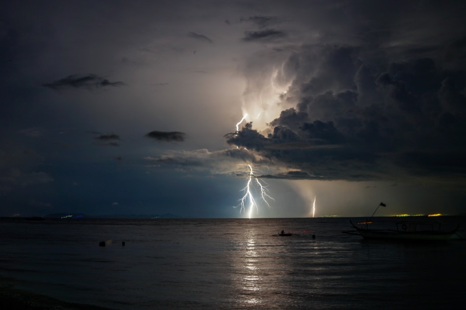 Lightning streaks across the sky in Balayan Bay in Mabini, Batangas on July 11, 2020. Danny Ocampo, ABS-CBN News/File