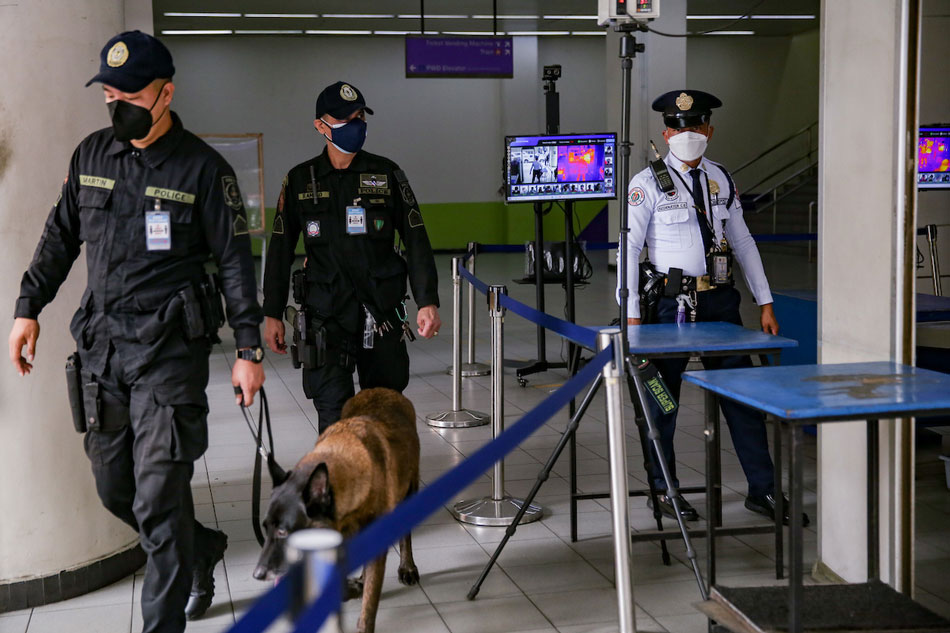 A K-9 unit inspects the Recto Station of the LRT-2 in Manila on February 22, 2022. George Calvelo, ABS-CBN News