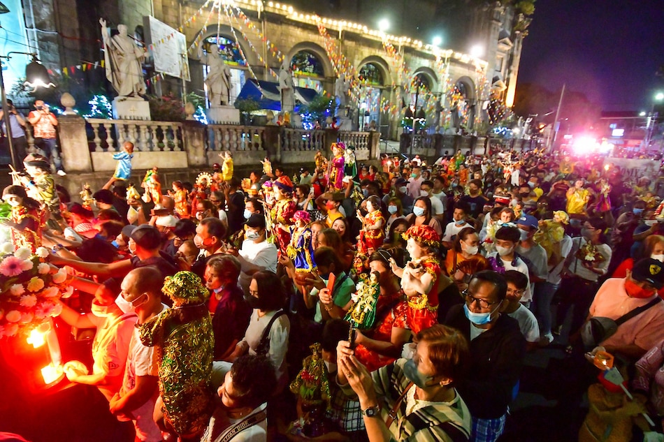Devotees participate in a motorcade with images of the Santo Niño from Tondo Church in Manila on its feast day, January 15, 2023. The motorcade is held in place of the traditional 'Lakbayaw' due to continuing COVID-19 cases, according to the parish. Mark Demayo, ABS-CBN News