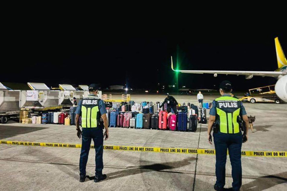 A K-9 unit checks airplane luggage after a passenger at Davao International Airport made a bomb joke on Sunday, Jan. 29, 2023. Courtesy of DIAPS