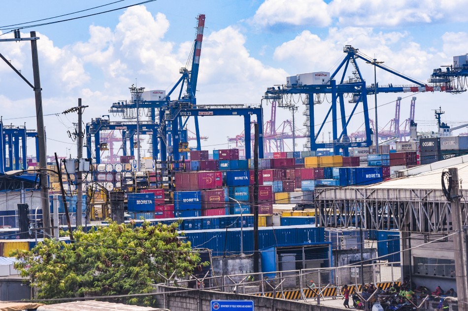 Container vans stacked together are seen inside the Philippine Ports Authority (PPA) compound in Manila on April 1, 2020. George Calvelo, ABS-CBN News/File