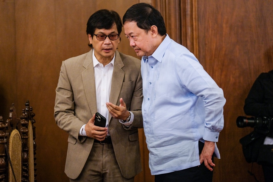 Interior and Local Government Secretary Benjamin Abalos (L) and Solicitor General Menardo Guevarra during the seventh cabinet meeting led by President Ferdinand “Bongbong” Marcos Jr. at the Malacañang Palace on Monday, September 12, 2022. Yummie Dingding, PPA/ Pool/File