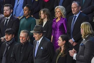 'Smooch of the Union': US first lady steals show with wayward kiss