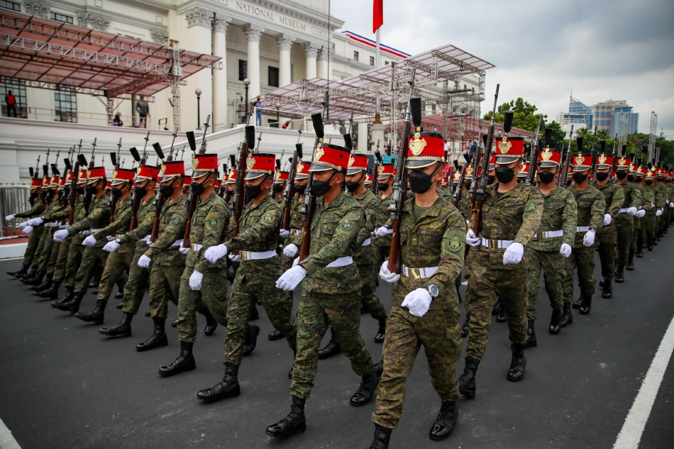 Members of the various components of the Armed Forces of the Philippines and civilian security forces rehearse for the Civic and Military parade in front of the National Museum in Manila, Monday as part of the preparations for the upcoming inauguration of President-elect Ferdinand Marcos Jr. on June 30. Jonathan Cellona, ABS-CBN News