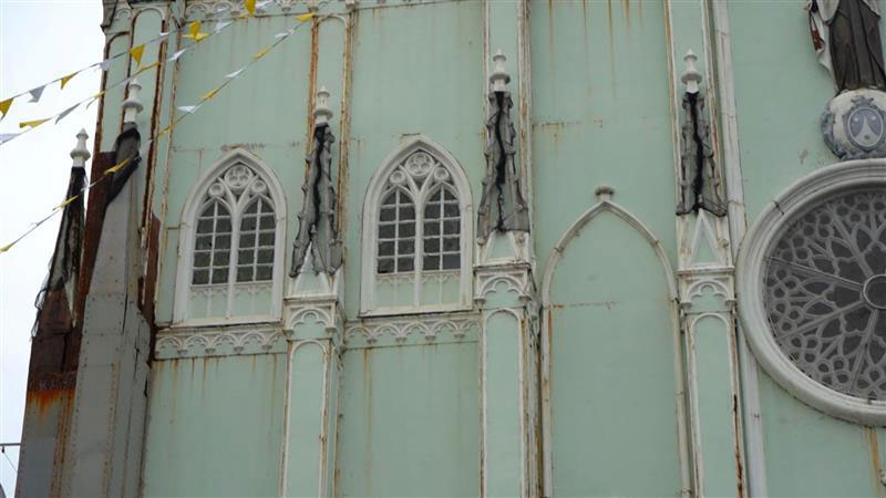 Visible rusting on the façade of San Sebastian Basilica.