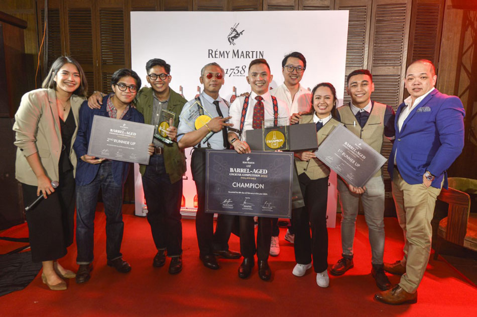 The winners of the first-ever Rémy Martin 1738 Accord Royal Barrel-Aged cocktail competition pose for a group photo. Sherwin Nagano