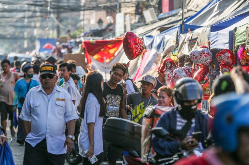 People flock to the Dangwa Flower Market in Manila on Valentine’s day, February 14, 2023, as they look for flowers for their loved ones. Jonathan Cellona, ABS-CBN News/file