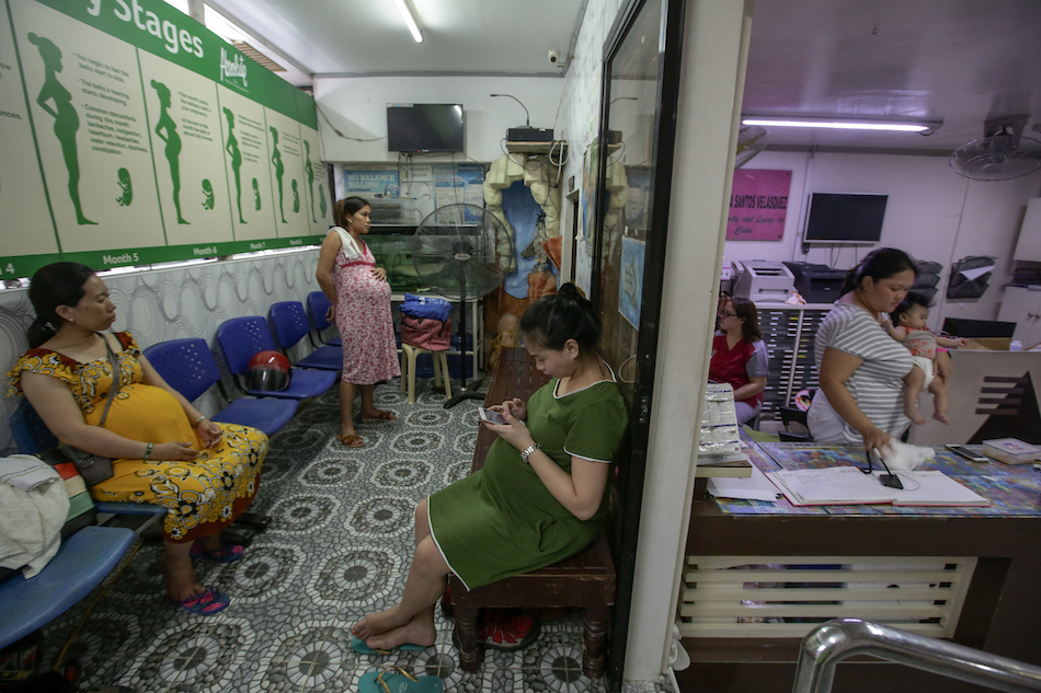 Pregnant women wait at the CSV Maternity and Lying-in Clinic in Quezon City, Oct. 2, 2018. Jonathan Cellona, ABS-CBN News/File