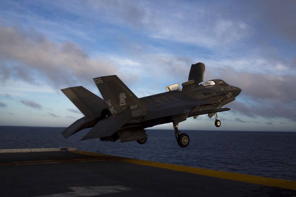 An F-35B Lightning ll fighter aircraft with Marine Medium Tiltrotor Squadron 265 (Reinforced) aboard the amphibious assault ship USS Wasp (LHD 1) takes off during twilight flight operations while underway in the the Philippine Sea, June 6, 2019. Photo courtesy Cameron E. Parks/US Marine Corps/Handout