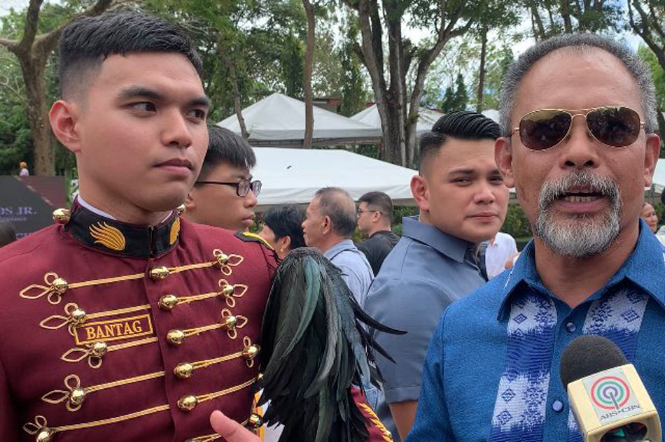 Suspended Bucor chief Gerald Bantag with his son Seal, who graduated from the PNPA on Friday. Joyce Balancioi, ABS-CBN News 