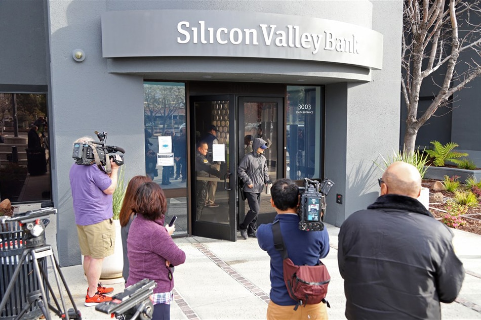 A customer leaves the headquarters of Silicon Valley Bank (SVB) in Santa Clara, California, USA, 13 March 2023. The Federal Deposit Insurance Corporation (FDIC) took control of the bank's assets, making it the largest bank to do so since the 2008 finical crisis. George Nikitin, EPA-EFE