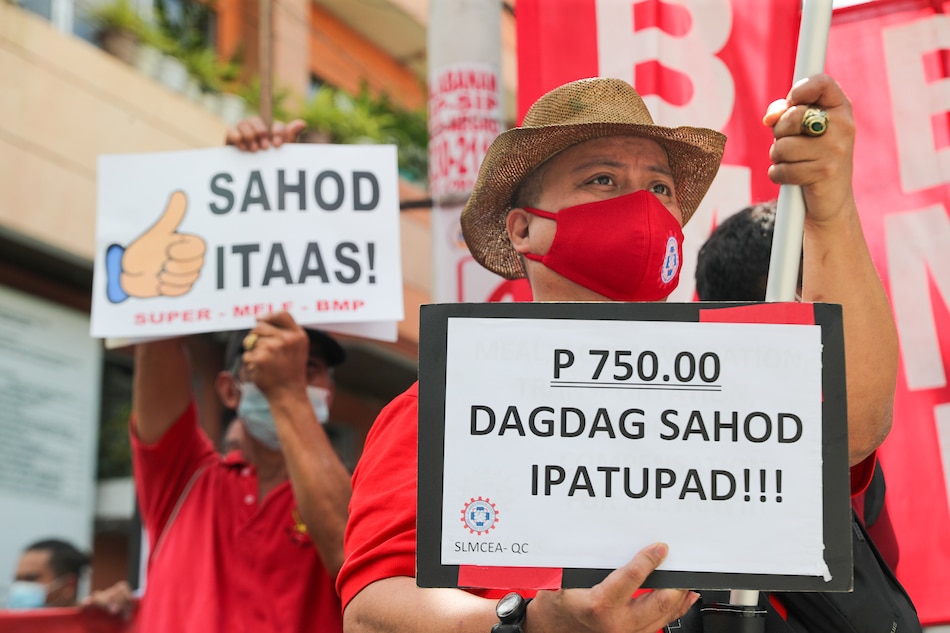 Labor groups hold a protest march to the Regional Wage Tripartite and Productivity Council (RWTPC) office located at the National Wages and Productivity Commission (NWPC) headquarters in Malate, Manila on March 28, 2022. The group urged the agency to approve their call for the minimum wage increase from P537 to P750. Jonathan Cellona, ABS-CBN News