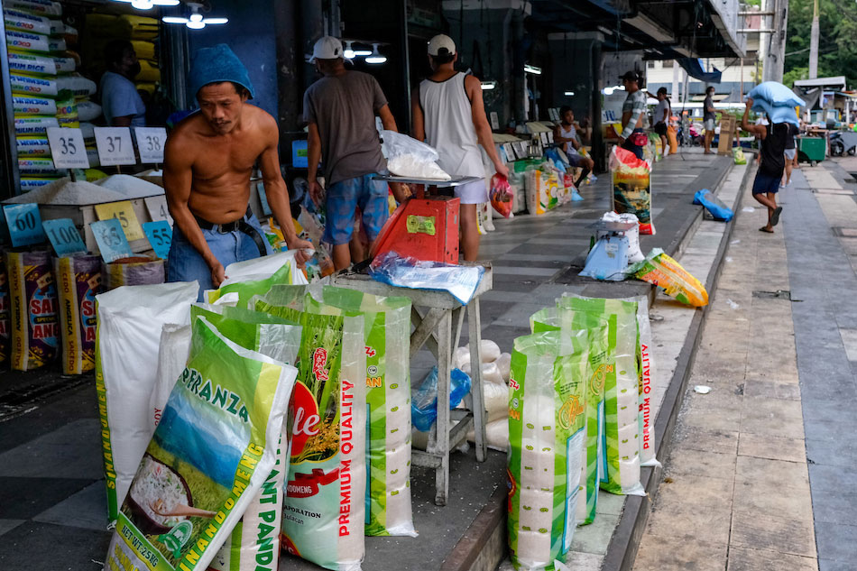 Workers repack their rice products for sale at the Pasig City Mega Market on July 5, 2022. After the Philippine Statistics Authority released its report showing the inflation rate hit 6.1 percent in June, president Ferdinand Marcos Jr. disagreed and said that much of the country’s inflation rate was “imported”. George Calvelo, ABS-CBN News