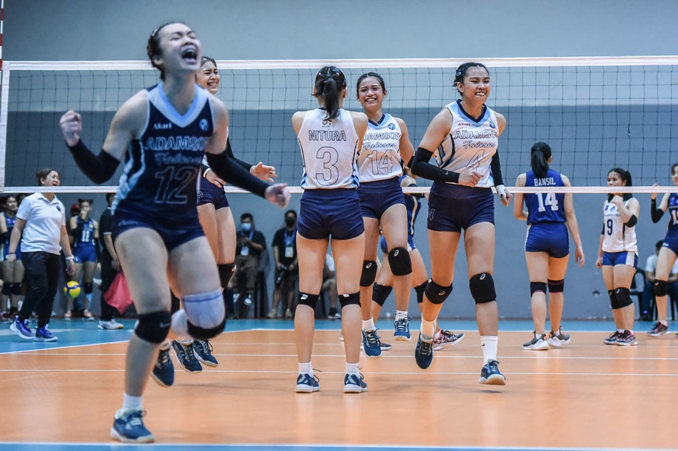 Adamson celebrates after scoring against NU in the UAAP Season 85 girls' volleyball Finals. UAAP Media.