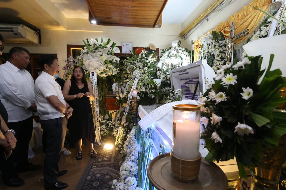 President Ferdinand Marcos Jr visits the wake of slain Negros Oriental Governor Roel Degamo in Dumaguete City on March 8, 2023. Accompanied by other government officials, Marcos took a moment to condole Degamo's wife, Pamplona Mayor Janice Vallega-Degamo. Rene Dilan, PPA Pool
