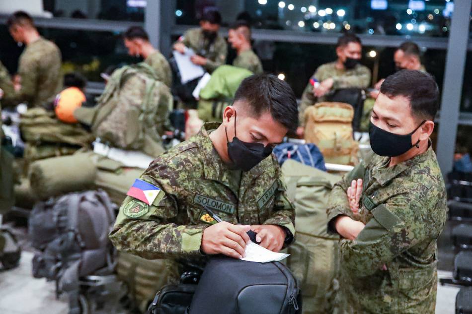 The Philippine contingent composed of members of various agencies prepare before participating in search and rescue operations in quake hit Turkey at the Ninoy Aquino International Airport (NAIA) Terminal 3 in Pasay City on Feb. 8, 2023. Jonathan Cellona, ABS-CBN News/File