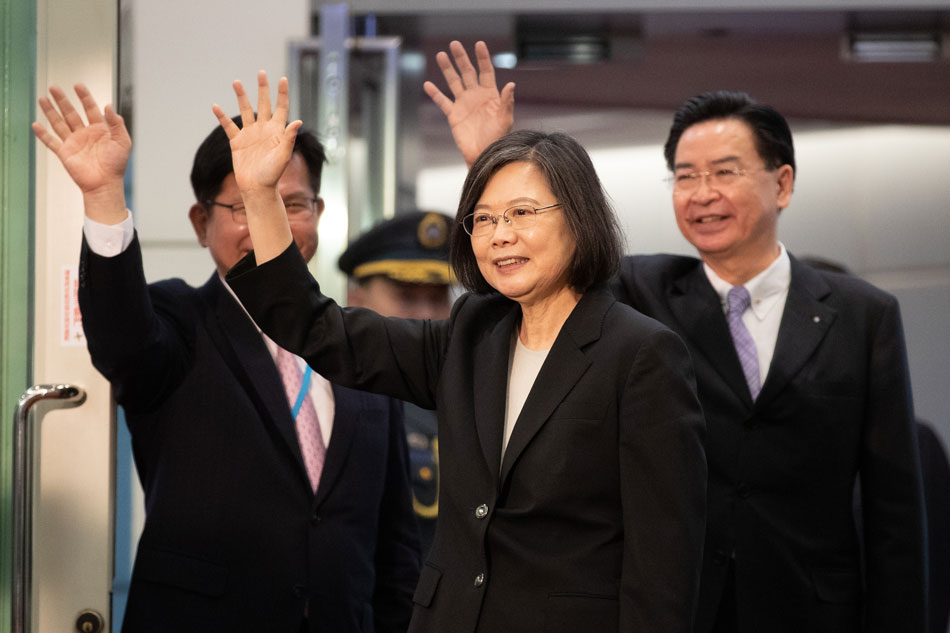 Taiwanese President Tsai Ing-wen waves during her departure for Central America, inside Taoyuan International Airport, in Taoyuan, Taiwan, 29 March 2023. Tsai embarks on a journey to diplomatic allies Guatemala and Belize, with earlier stops in New York and Los Angeles. Ritchie B. Tongo, EPA-EFE