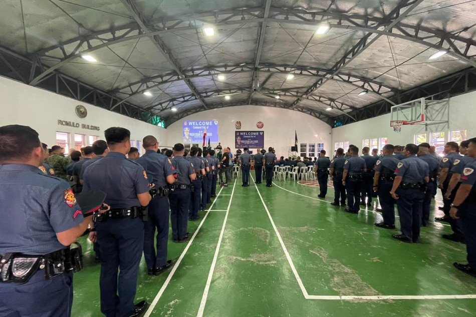 Police formed lines as newly appointed NCRPO Chief Police Major General Edgar Alan Okubo facilitated a command conference on March 30, 2023.
