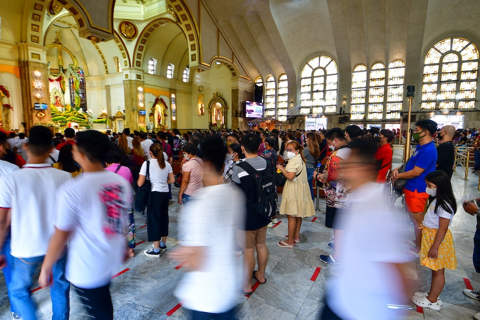 Catholic devotees attend a Mass inside the Minor Basilica of the Black Nazarene in Manila on Jan. 8, 2023. Mark Demayo, ABS-CBN News/File