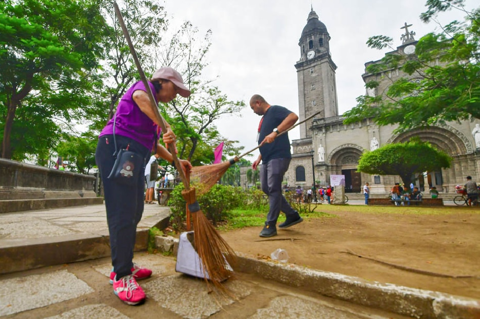 Volunteers participate in the 'Cleantramuros' clean-up drive in Manila on April 16, 2023.   Mark Demayo, ABS-CBN News