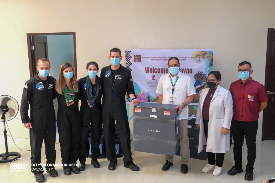 Crew members from the Polaris dawn mission, led by American billionaire and civilian astronaut Jared Isaacman (4th from left), turn over SpaceX's Starlink satellite internet kits to staff of the Southern Philippines Medical Center in Davao City on April 19, 2023. Courtesy: Davao City Information Office