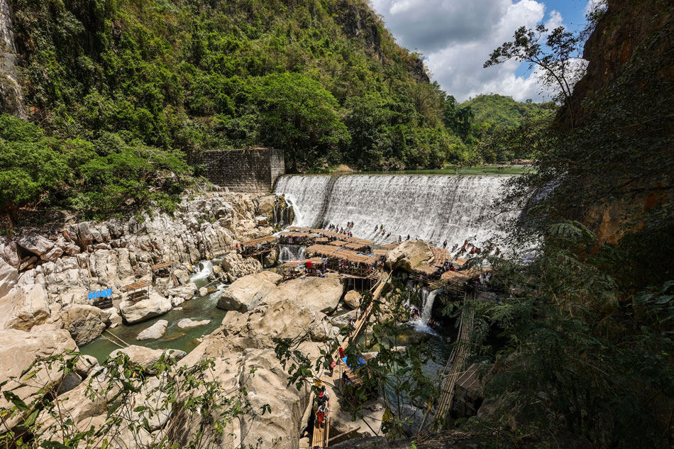 People cool off at the Wawa Dam in Rodriguez, RIzal on March 18, 2023 as the summer season nears. Maria Tan, ABS-CBN News