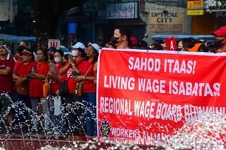 DOLE aims for balanced solution over proposed 150 wage hike